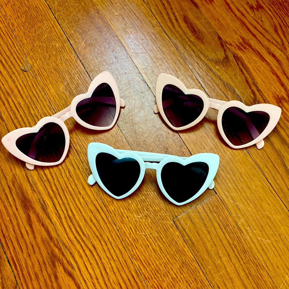 Three never used two pink heart sunglasses and one white